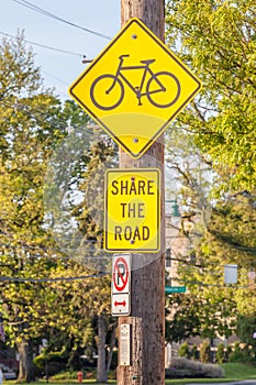 Bicycle lane sign on side walk for road safe warning.