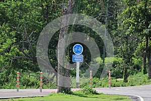 Bicycle lane sign on street.