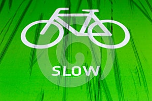 Bicycle lane with slow warning