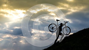 Bicycle man silhouette at sunset