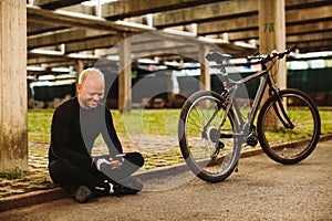 Bicycle man with smartphone