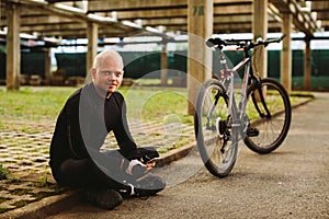 Bicycle man with smartphone