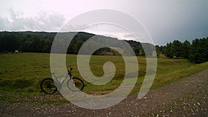 Bicycle in the meadow on friendly weathe