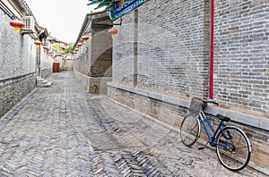 Bicycle in a narrow street in Yangliuqing Town in Tianjin