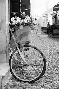 Bicycle in the old town of Alghero, in Italy photo