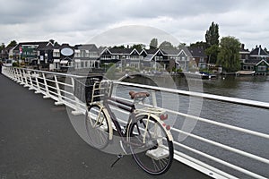 Bicycle parked on bridge