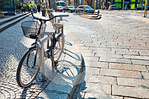 Bicycle parked on city street