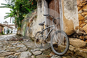 A bicycle parked on an old city street