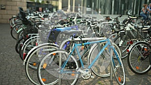 Bicycle parking in the city street. Group of bikes.