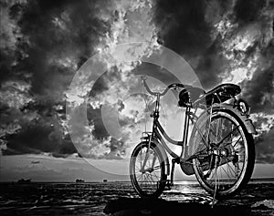 Bicycle parking under cloudy sky