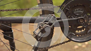 Bicycle Pedal Close-up, Smooth Camera Movement. Details of a Bicycle Standing in the Forest. Concept of Cycling and