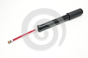 Bicycle pump with hose on white background