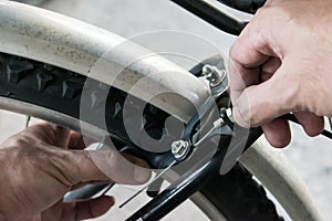 Bicycle rear wheel brake cable adjustment