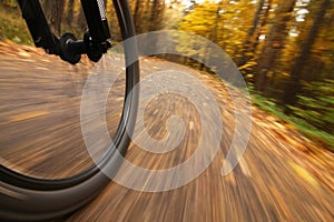 Bicycle riding, low angle motion blur photo