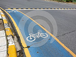 Bicycle road sign on asphalt