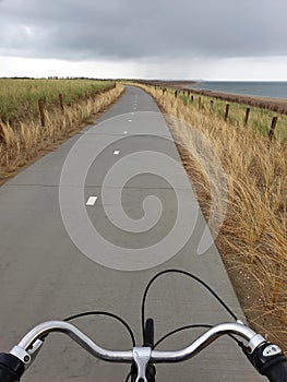 A bicycle road to nowhere twisting behind the horizon