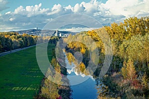 Water canal with mirror in autumn