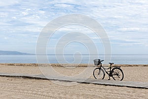 A bicycle on the sand of the beach