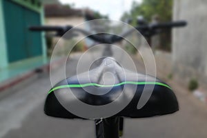 Bicycle seat or black saddle and seatpost isolated on white background