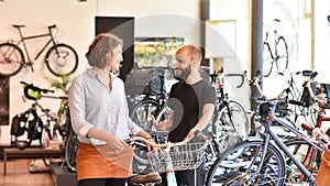 Bicycle shop consulting - salesman and customer in conversation