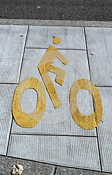 Bicycle sign path on the pavement