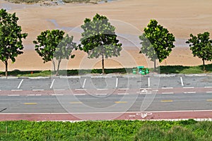 Bicycle sign on the road at beach