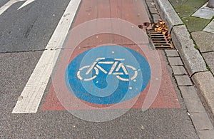 Bicycle sign on the road in a cycling lane photo