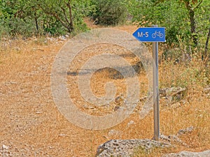 Bicycle signpost for mountain bike path in the Dalmatian hinterland