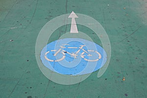 Bicycle signs on ground, concept for urban mobility, alternative transportation, bike lane, bikeway, street sign