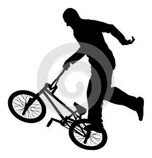 Bicycle stunts silhouette. Biker exhibition. Trick with bicycle.