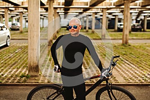 Bicycle style man in black sportswear