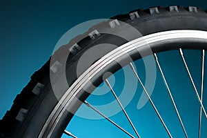 Bicycle tire and spoke wheel