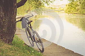 Bicycle track in park near river/walk by bicycle near the river