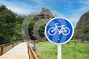 Bicycle traffic sign on nature walks and cycling path in natural park