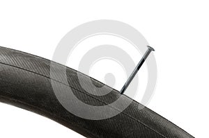 Bicycle tube puncture with nail photo