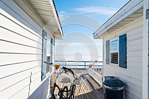 Bicycle between two beach houses