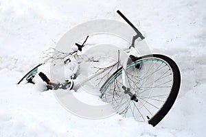 A bicycle was buried in the heavy snows.