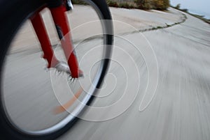 Bicycle wheel closeup in motion