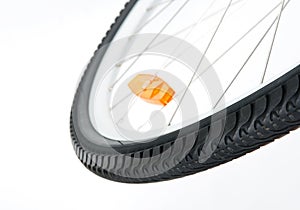 Bicycle wheel with orange reflector