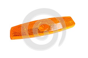 Bicycle wheel reflector isolated on white. Orange plastic reflector which is mounted on a bike spoke for safety at