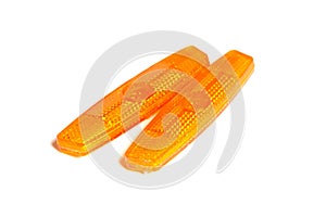 Bicycle wheel reflectors isolated on white . Two orange plastic reflectors for a bike spoke for safety at night