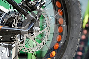 Bicycle wheel in a row close-up wheel detail, bicycle spoke.