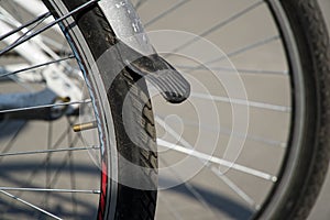 Bicycle wheel in a row close-up wheel detail, bicycle spoke.