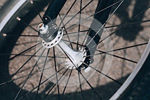 Bicycle wheel. Spoked wheel close-up. Bicycle wheel hub photo