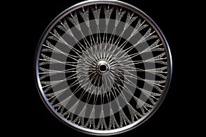 bicycle wheel with spokes and rim isolated on black
