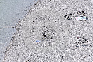 Bicycles on the beach waiting for the owners