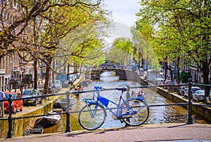 Bicycles on the bridge in  Amsterdam, Netherlands. Canals of Amsterdam