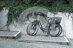 Bicycles parked on the sidewalk in a german tourist location on Rugen island