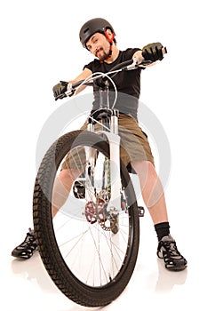 The bicyclist isolated on white.