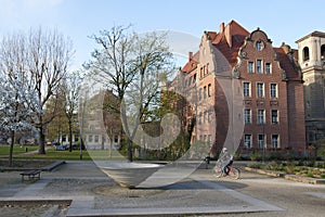 A bicyclist in a park of Berlin.